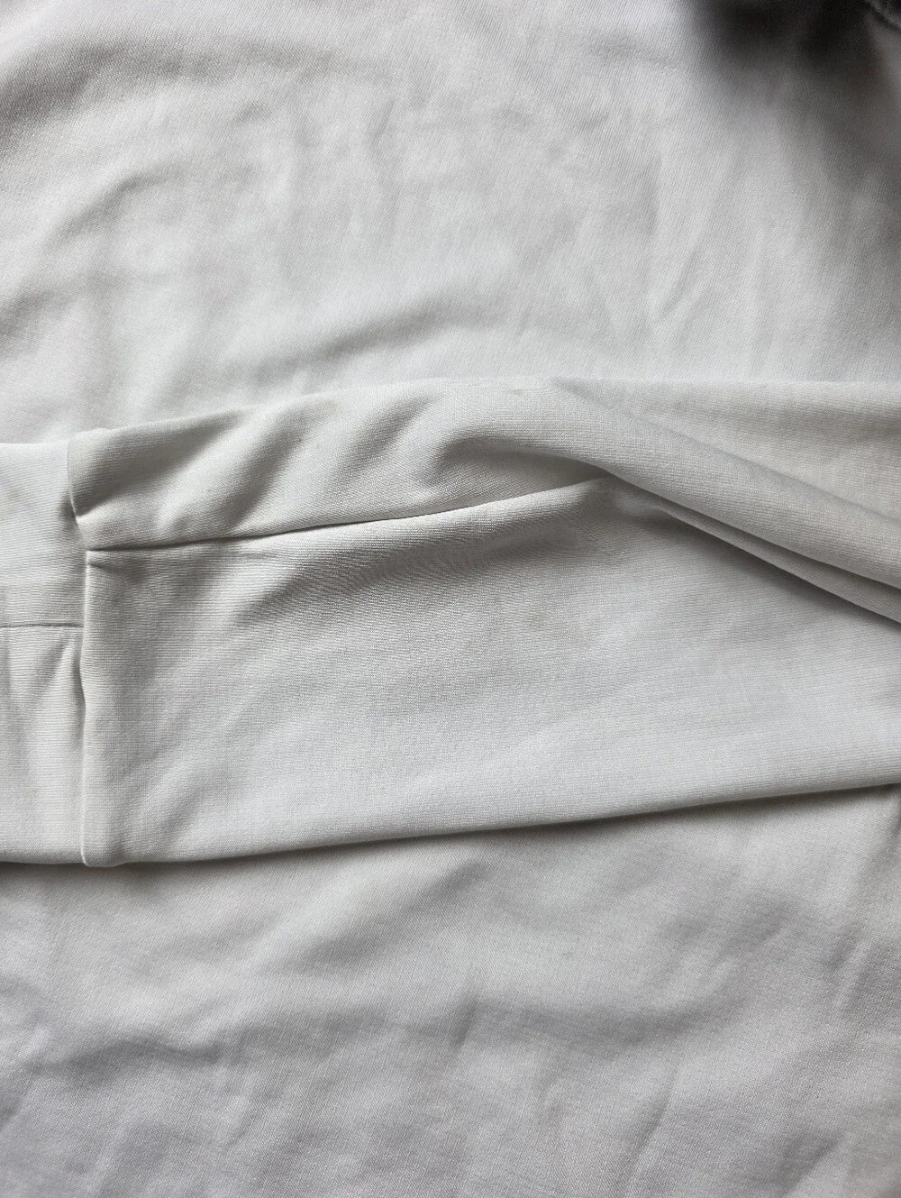 Nike Air Long Sleeve Polo Top in White with Black Trim